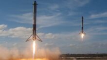 twom white flying rockets during daytime