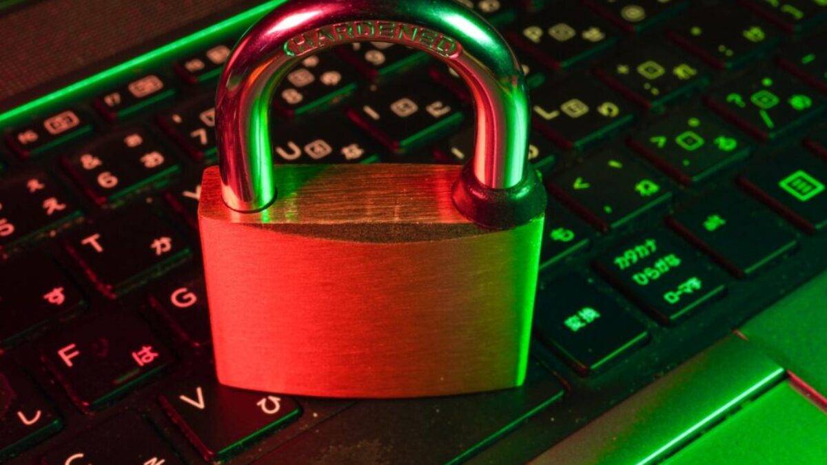 red padlock on black computer keyboard