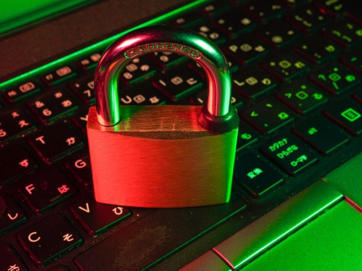 red padlock on black computer keyboard
