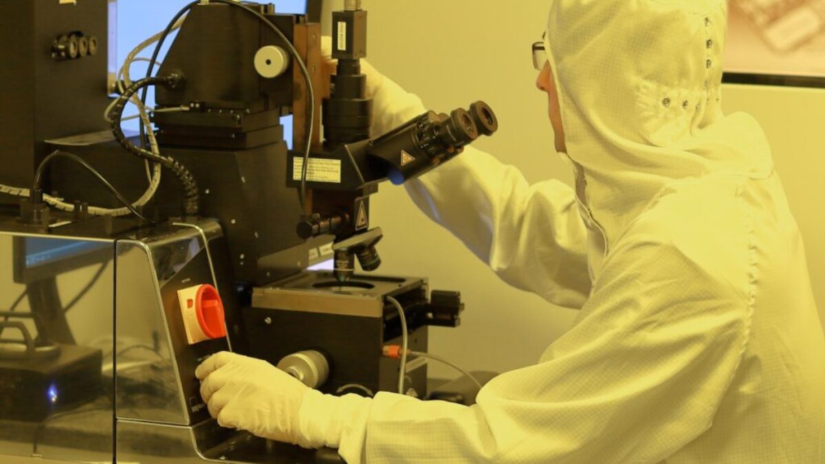 person using black industrial machine