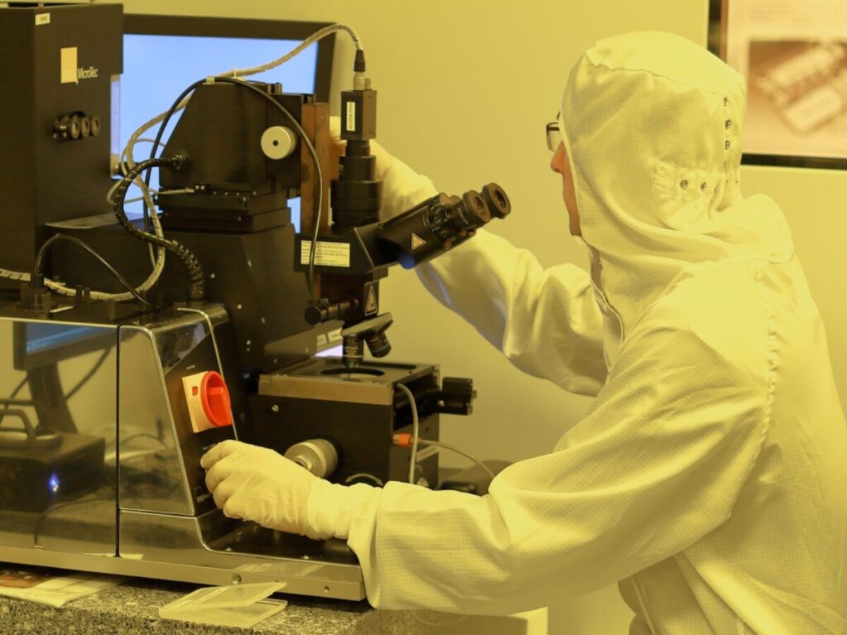 person using black industrial machine