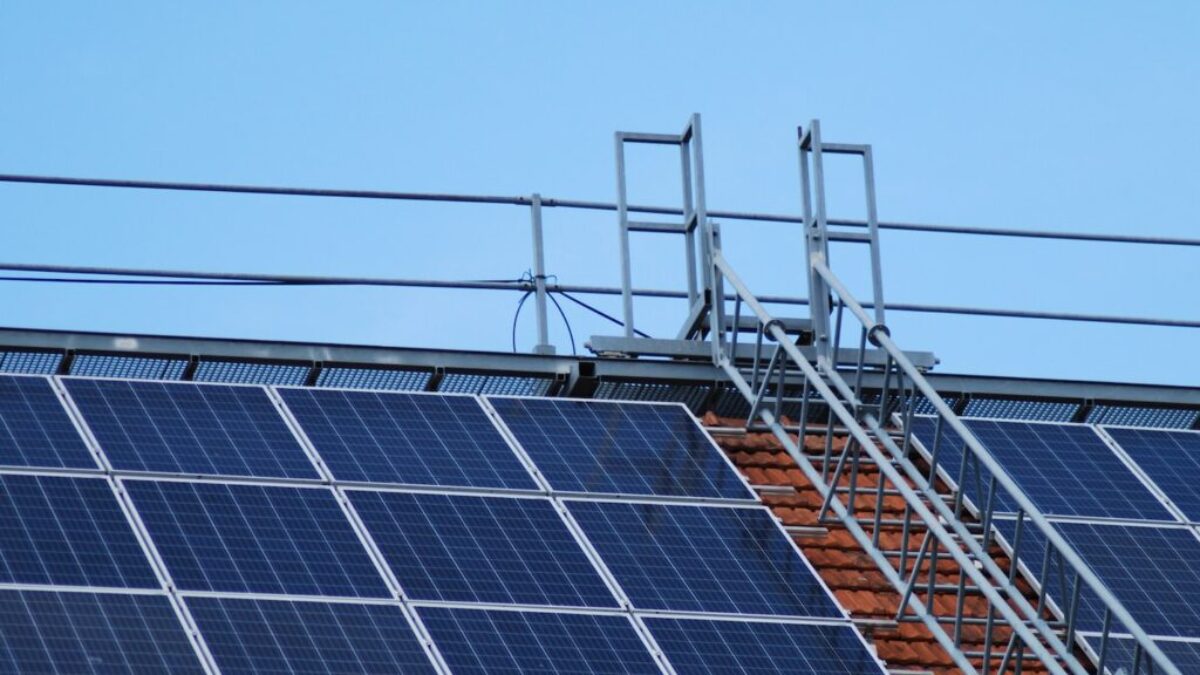 solar panels on gray metal frame under blue sky during daytime