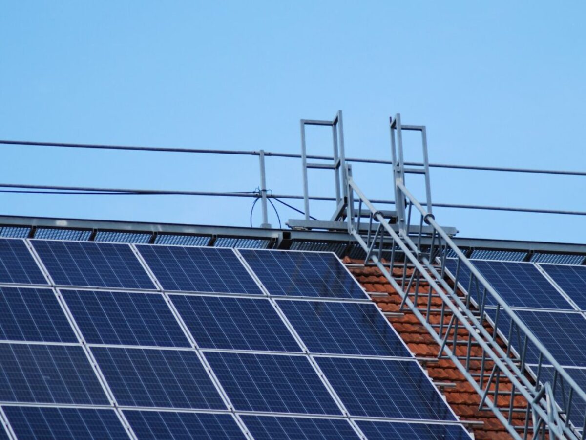 solar panels on gray metal frame under blue sky during daytime