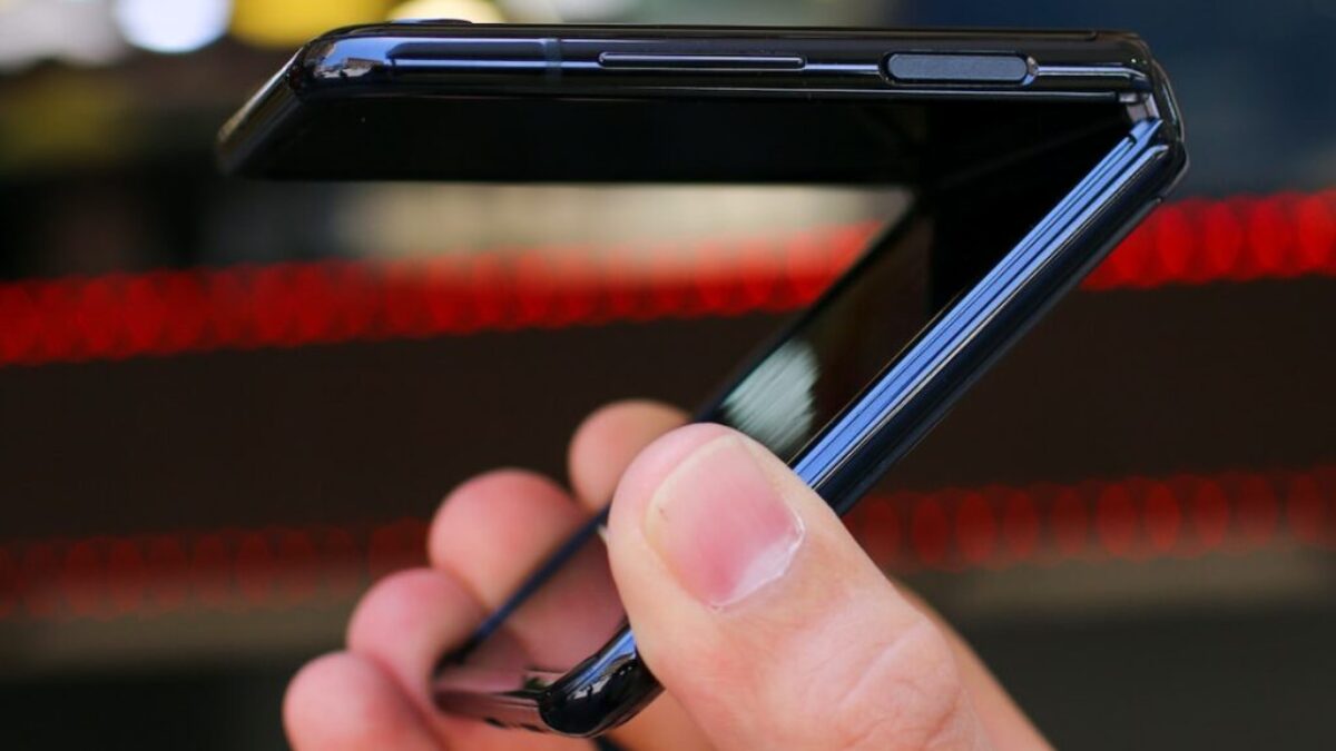 person holding black android smartphone