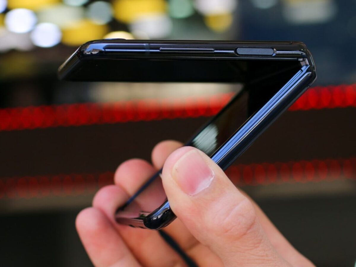 person holding black android smartphone