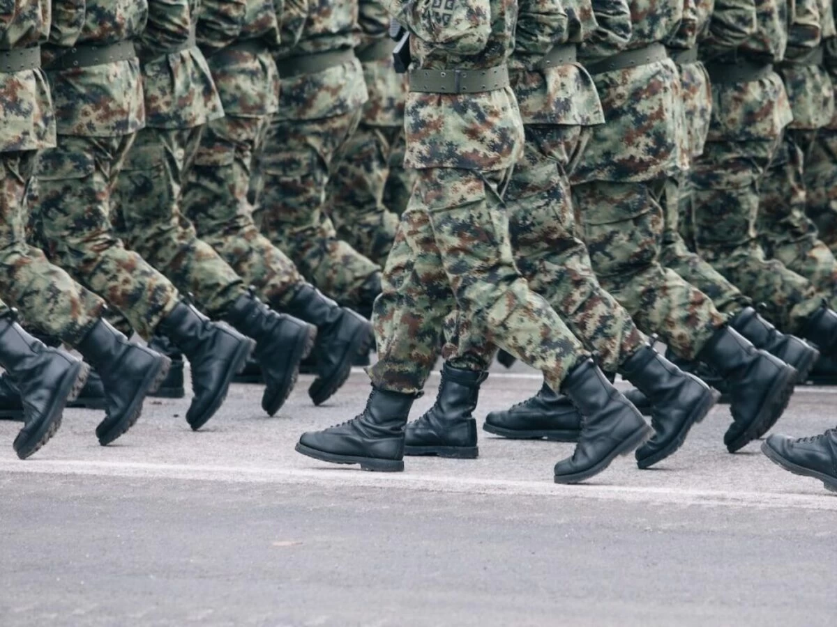 men in green and brown camouflage uniform