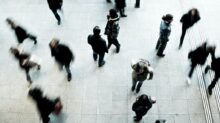 people walking on grey concrete floor during daytime