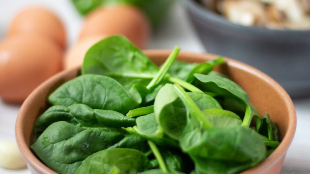 green vegetable on white ceramic bowl