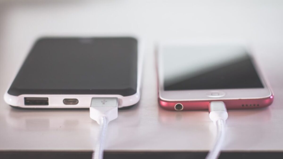 two phones on white table