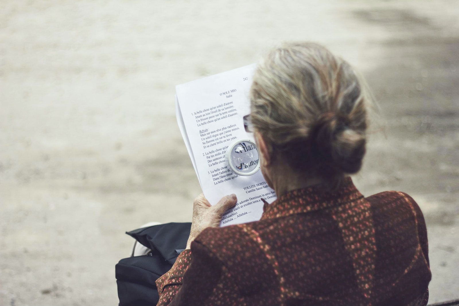 - Techsvět woman in brown top reading paper