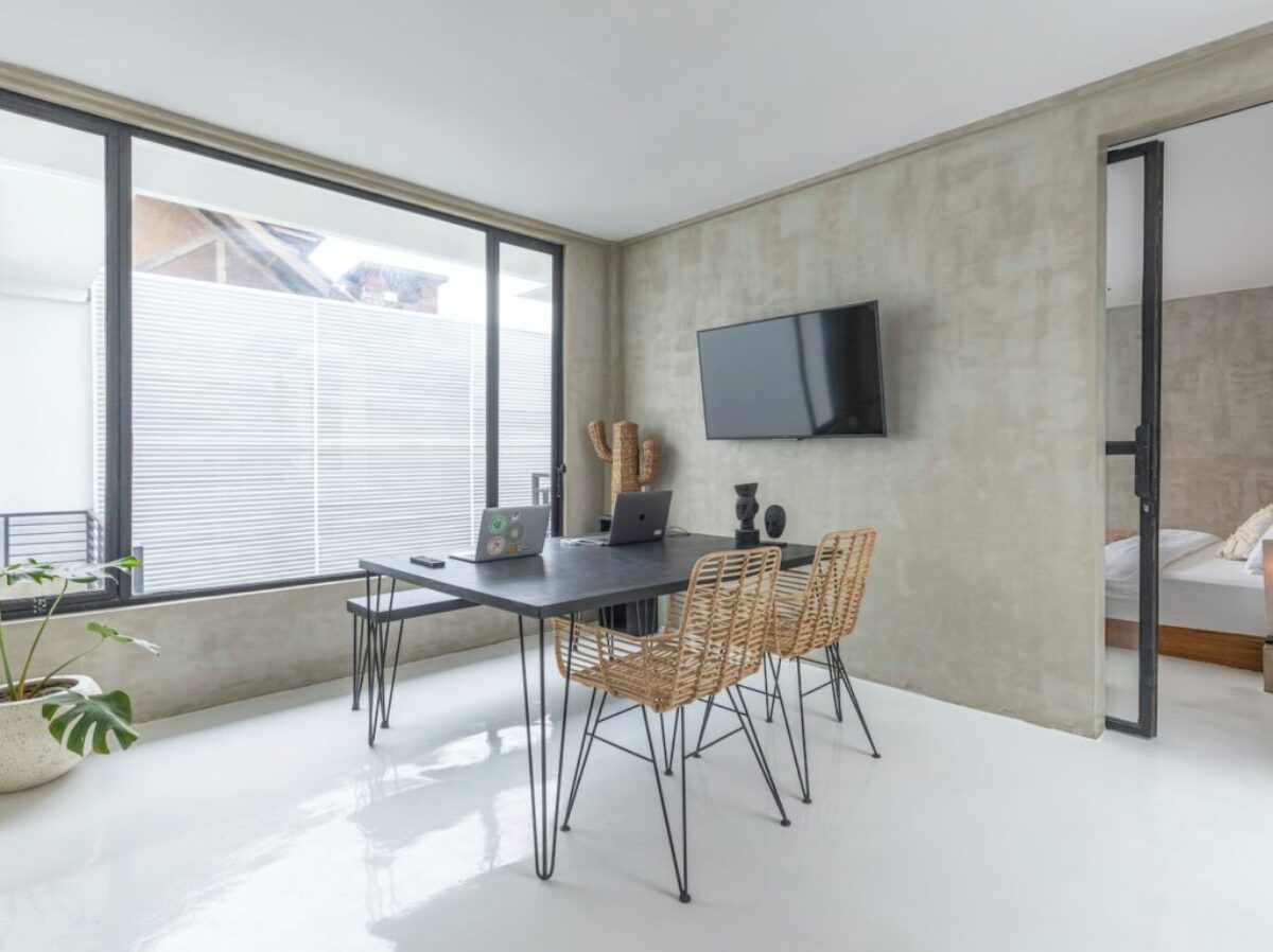 black flat screen tv on brown wooden table