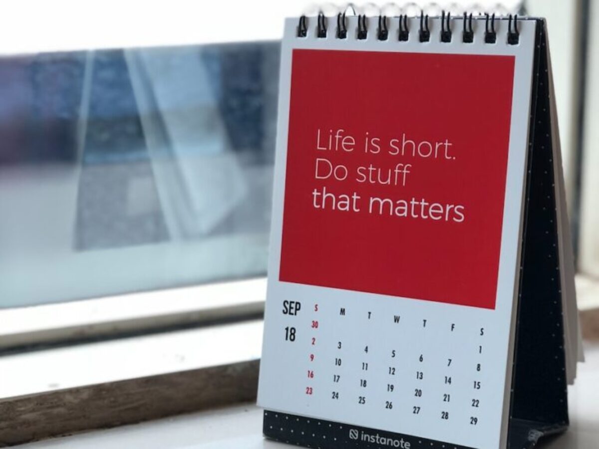 spiral freestanding calendar on white surface