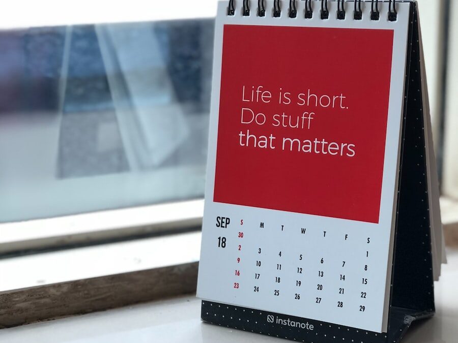 spiral freestanding calendar on white surface