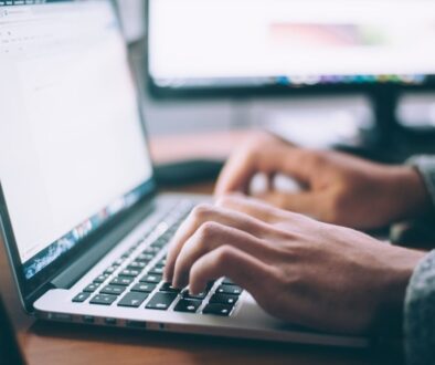 person using MacBook Pro