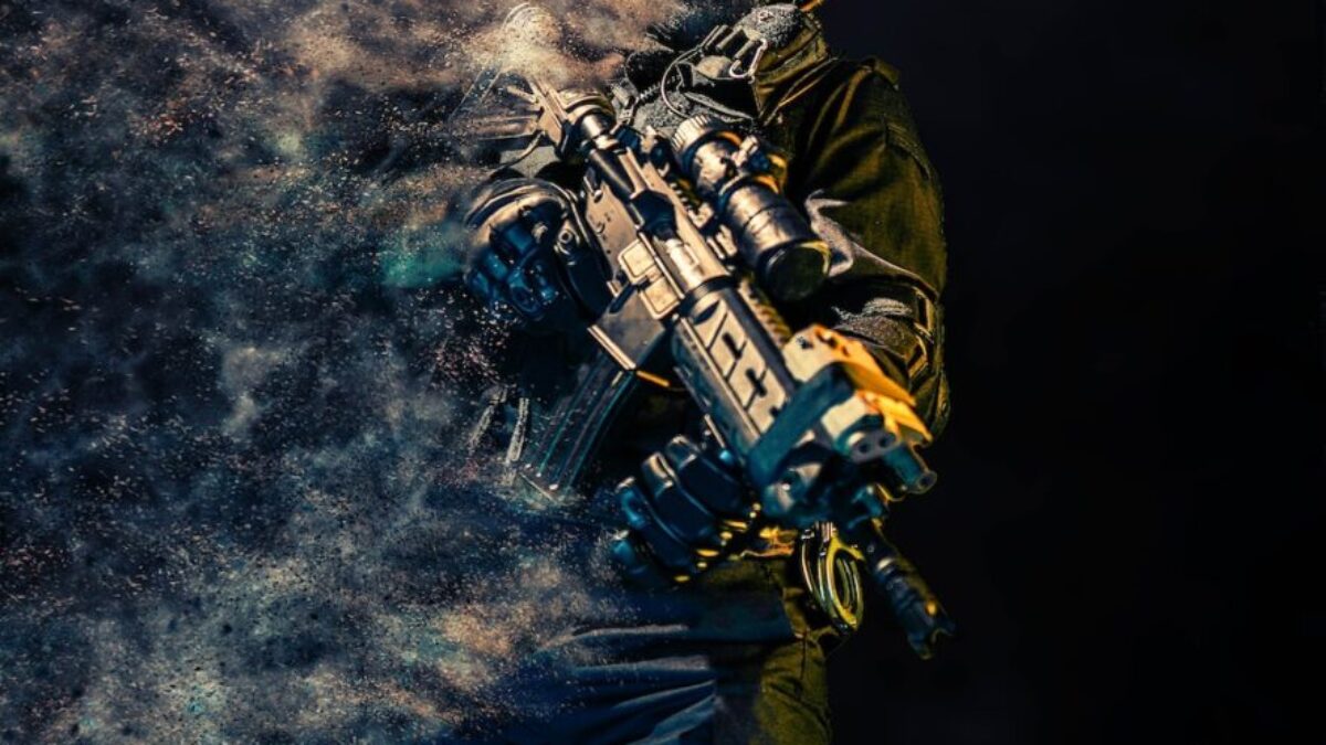 man holding rifle wallpaper