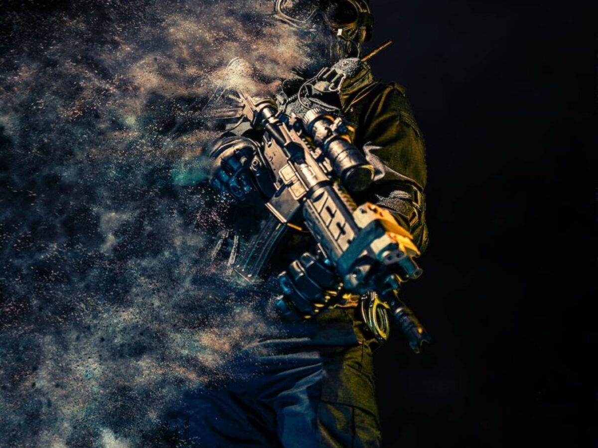man holding rifle wallpaper