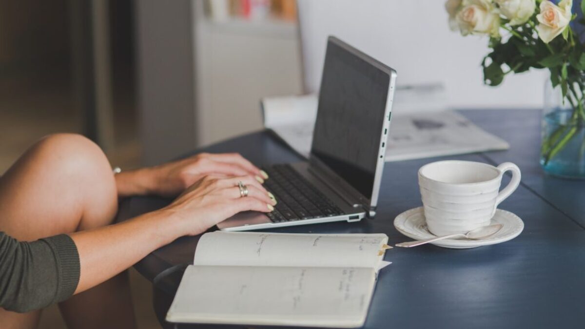 Person Using Black and Silver Laptop Computer