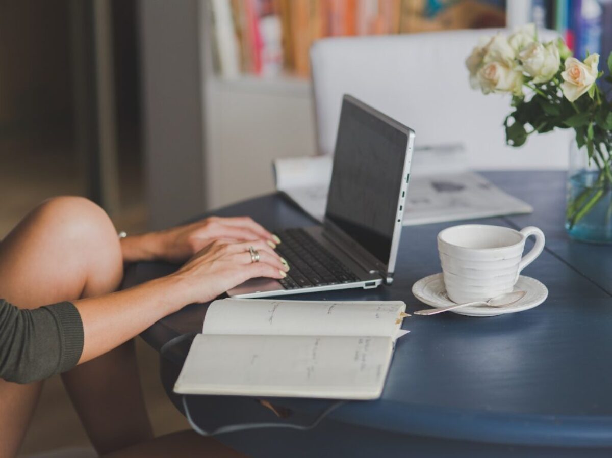 Person Using Black and Silver Laptop Computer