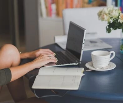 Person Using Black and Silver Laptop Computer