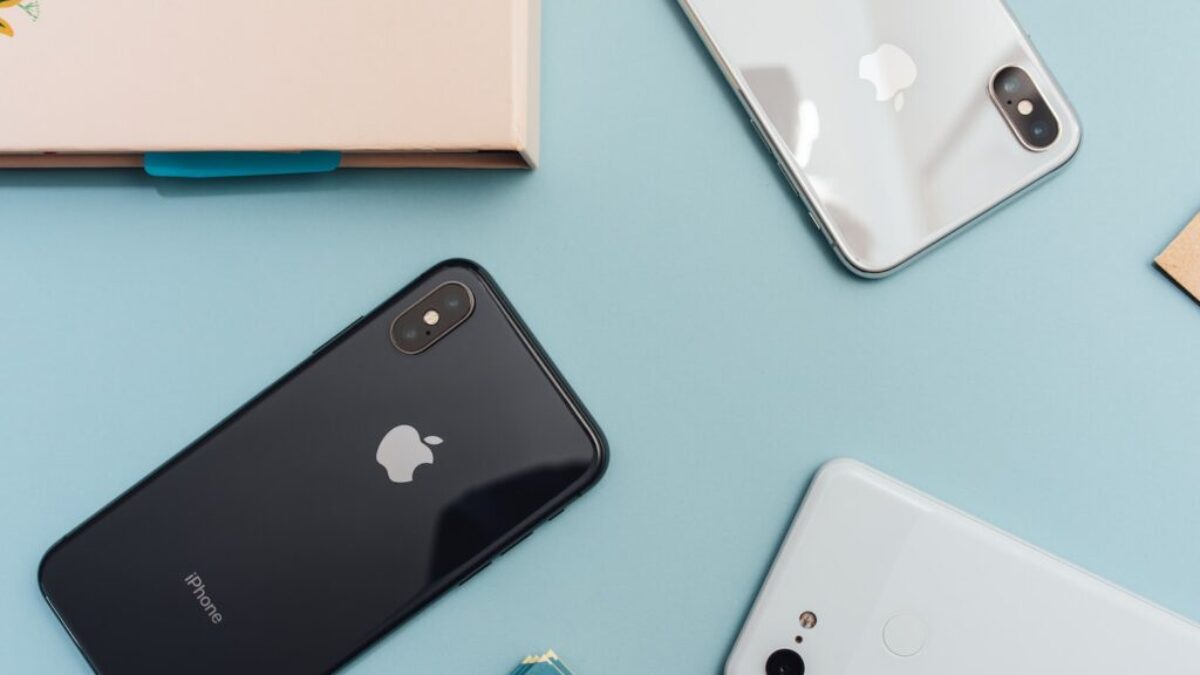 space gray iPhone X on blue surface