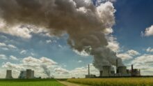 smoking factory during daytime