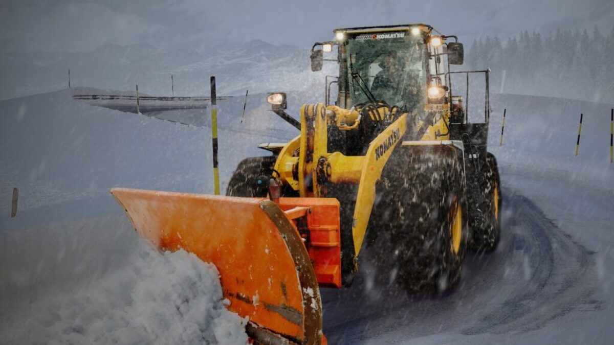 yellow and orange snow plouh