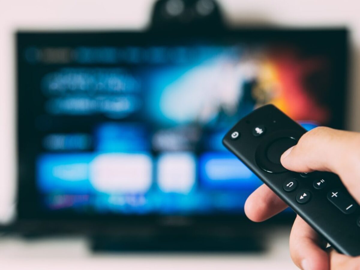 turned-on flat screen television