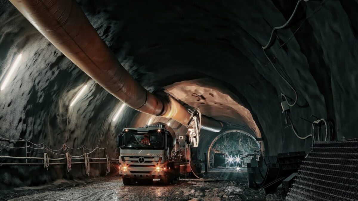 red and black truck in tunnel