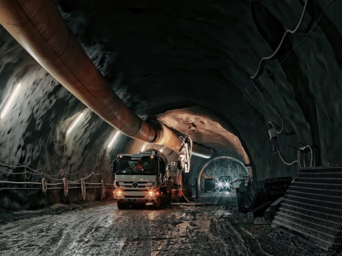 red and black truck in tunnel