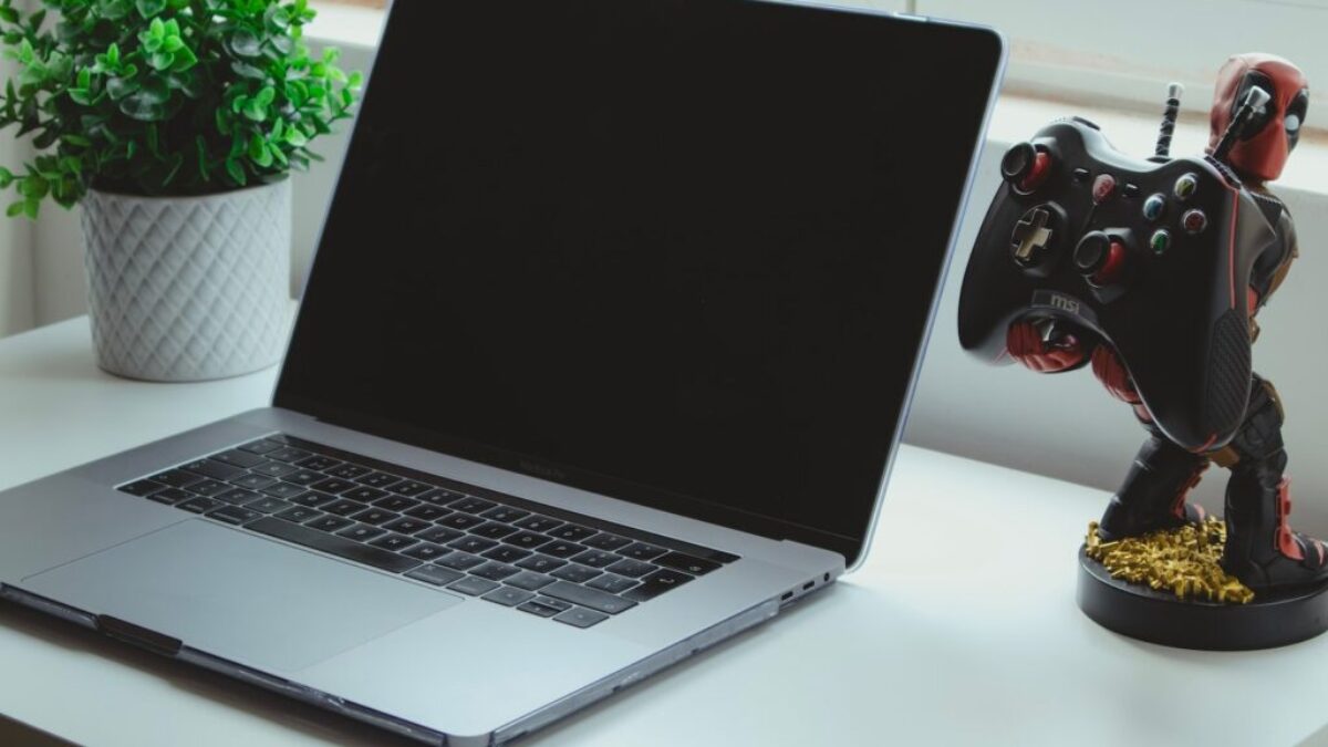 macbook pro on white table