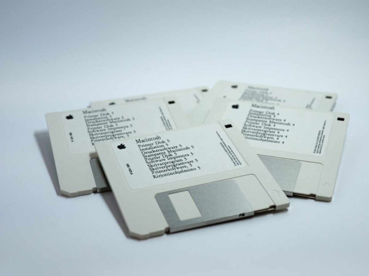 four MacBook diskettes