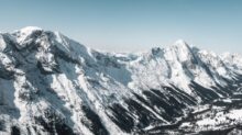 snow covered mountain under blue sky during daytime