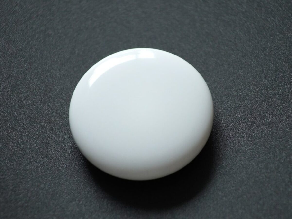 white egg on black textile
