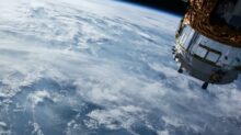 view of Earth and satellite