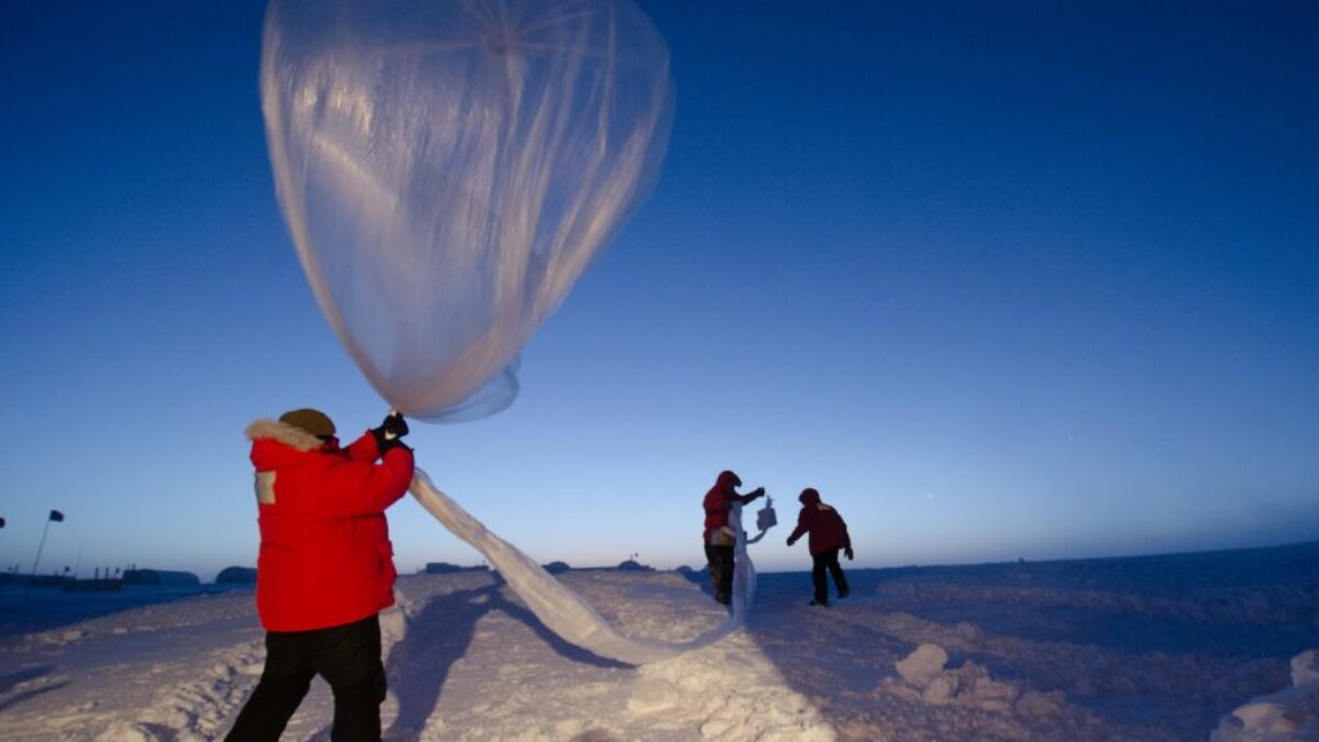 Launching an ozonesonde balloon.