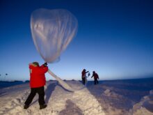Launching an ozonesonde balloon.