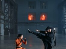 A Man and a Woman Doing Martial Arts
