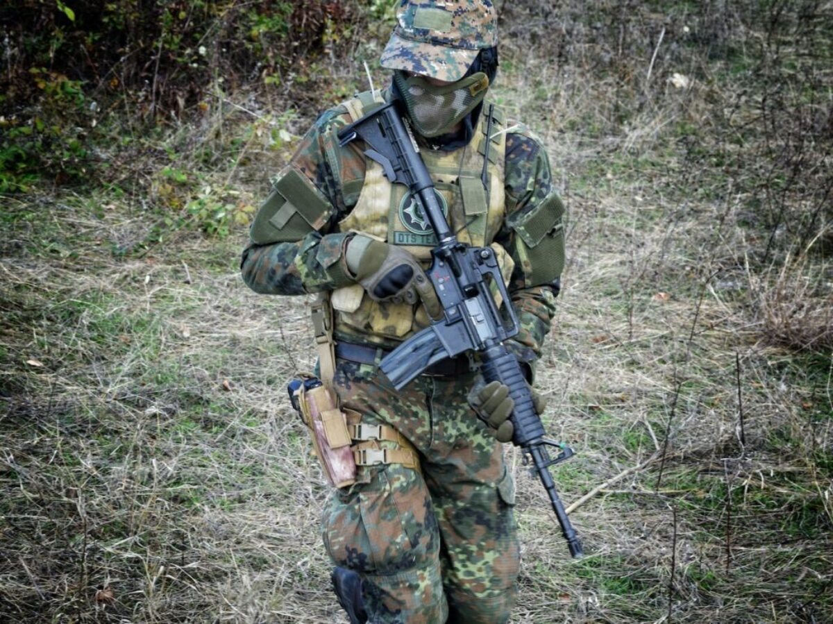 soldier holding rifle