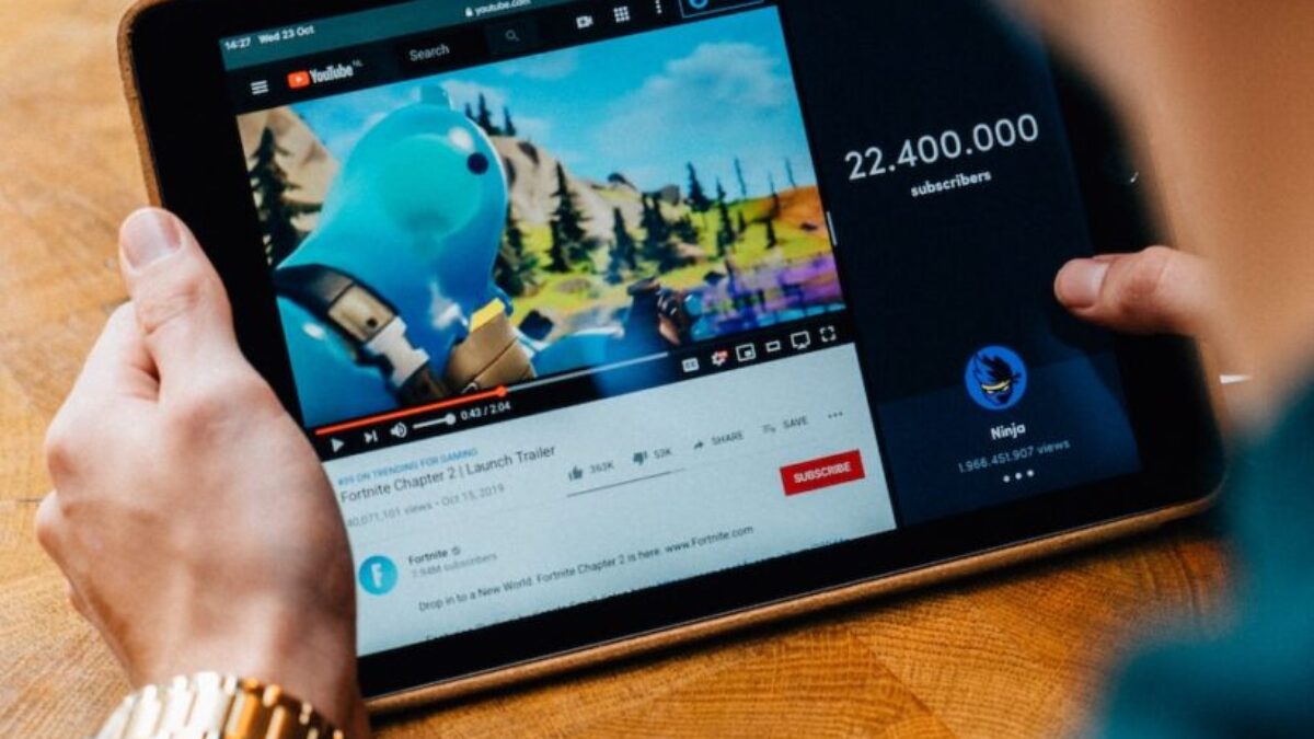 selective focus photography of person using tablet computer