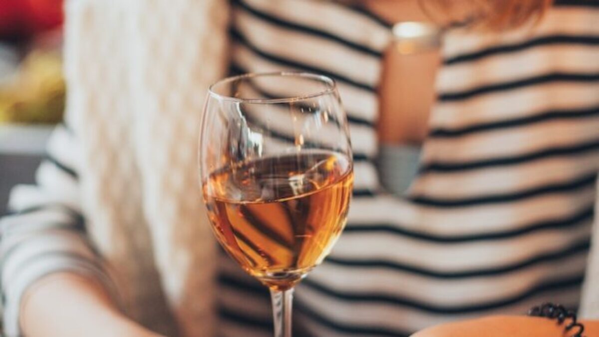 Woman Holding Glass of Wine