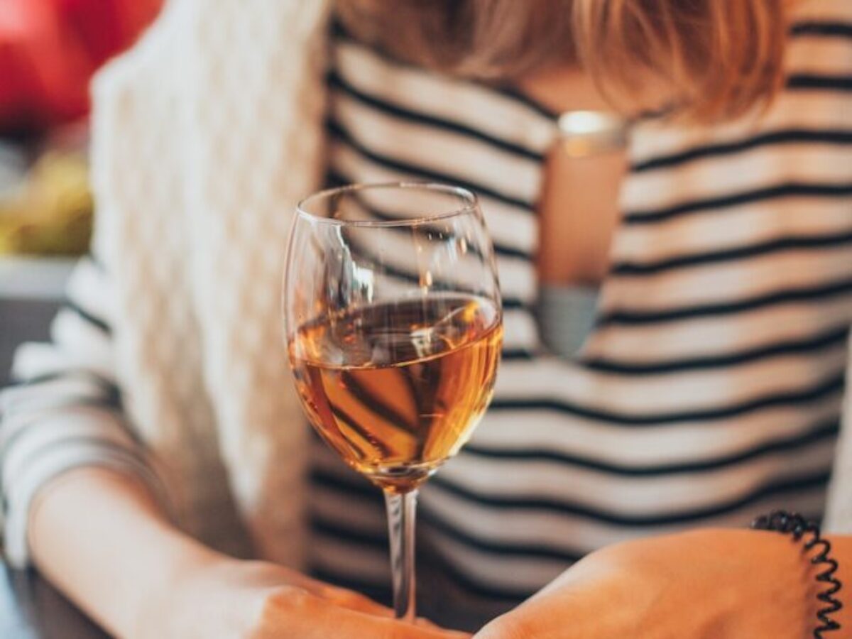 Woman Holding Glass of Wine