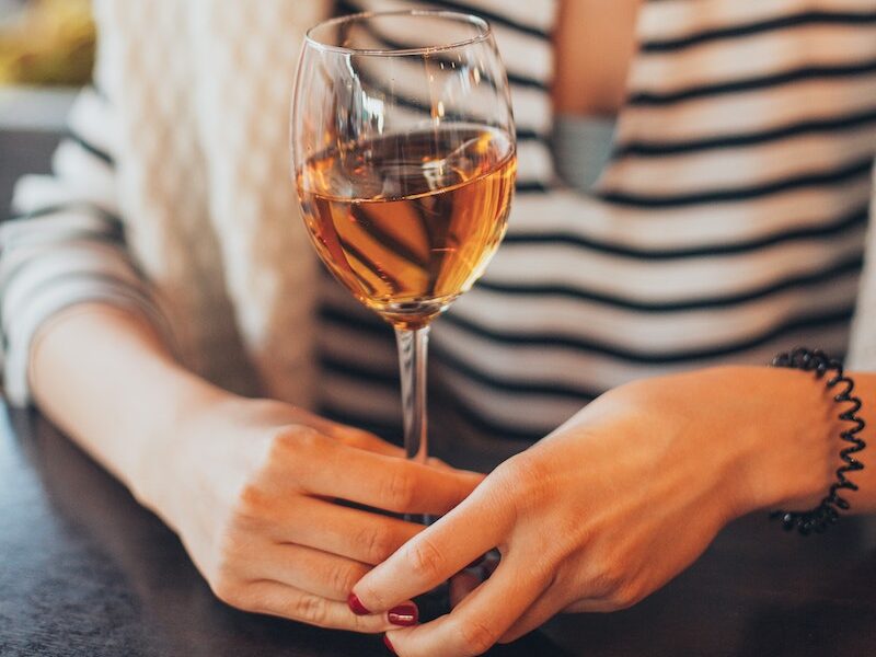 Woman Holding Glass of Wine