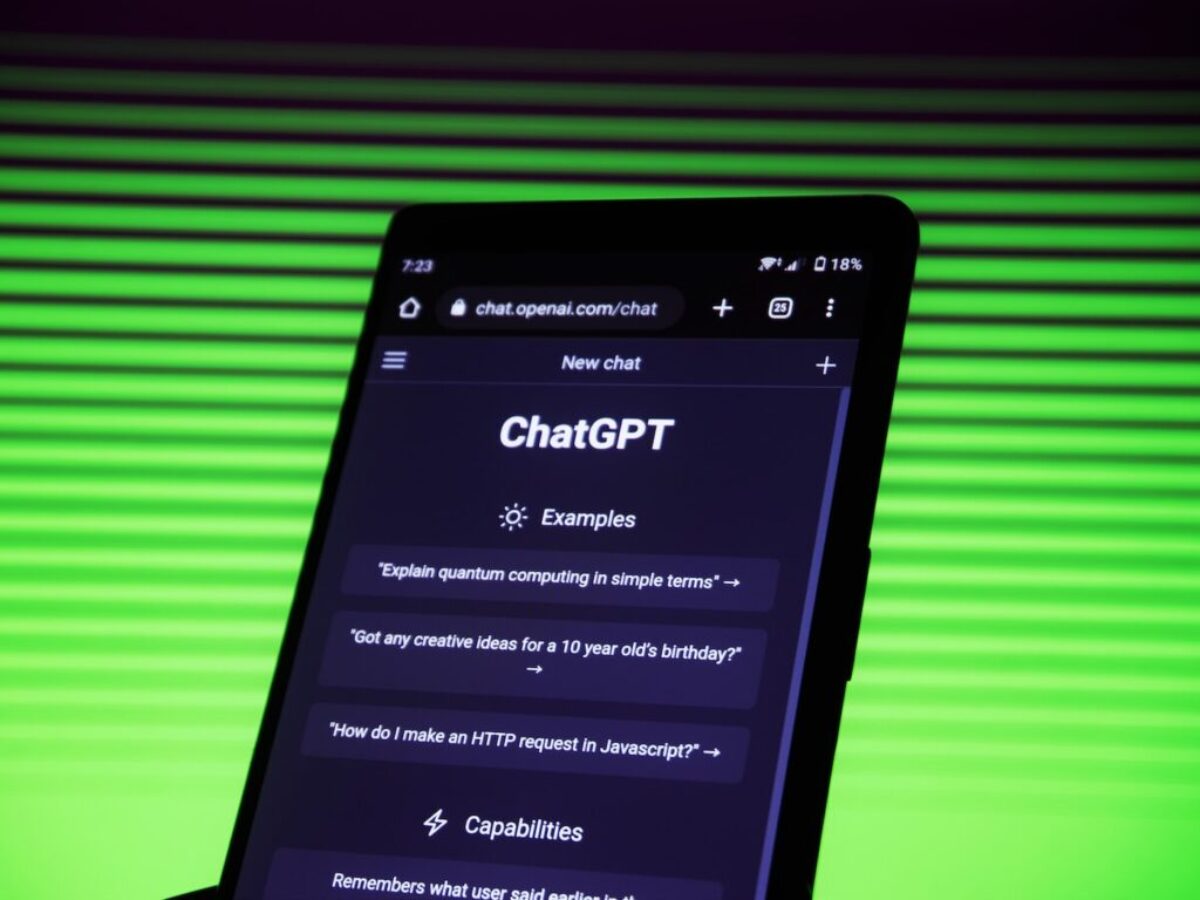 a close up of a cell phone on a table