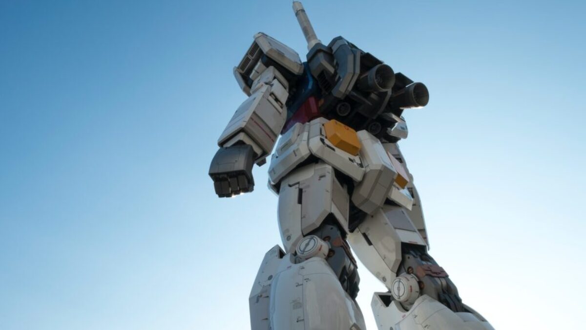 white and red robot statue