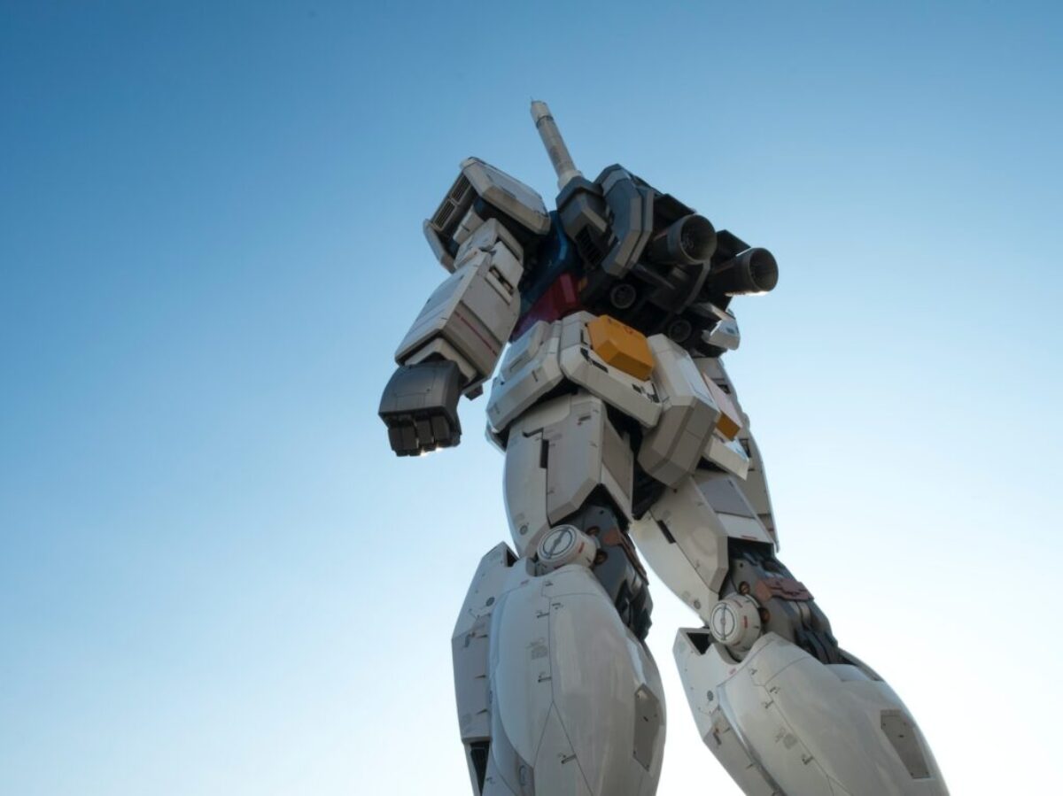 white and red robot statue