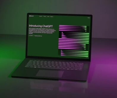 a laptop computer sitting on top of a table