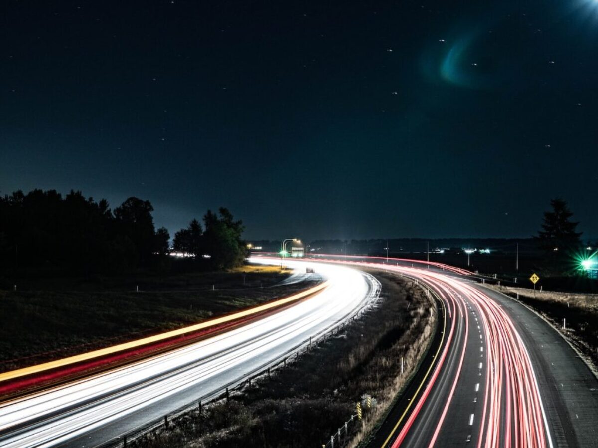 time lapse photography of cars on road