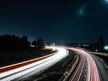 time lapse photography of cars on road