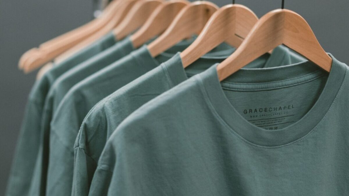 photo of blue crew-neck tops