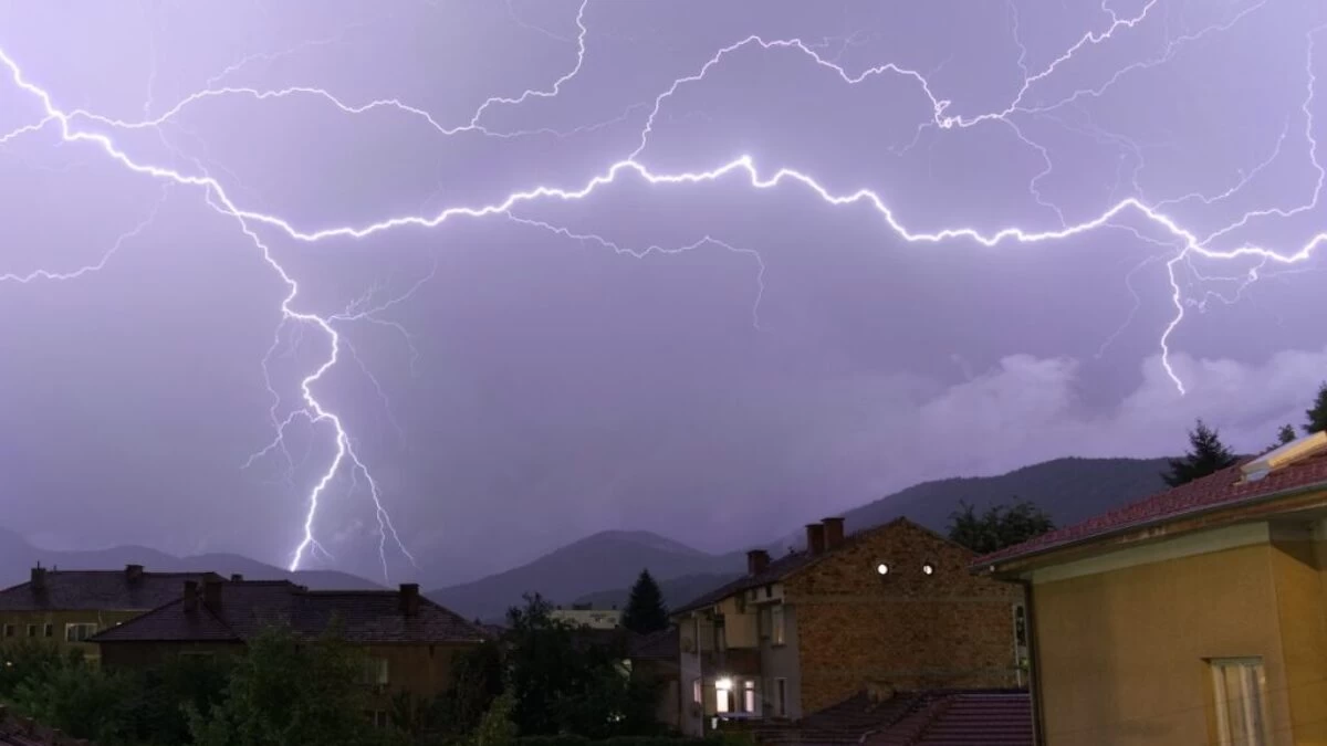 Brown Concrete House Under Lightning